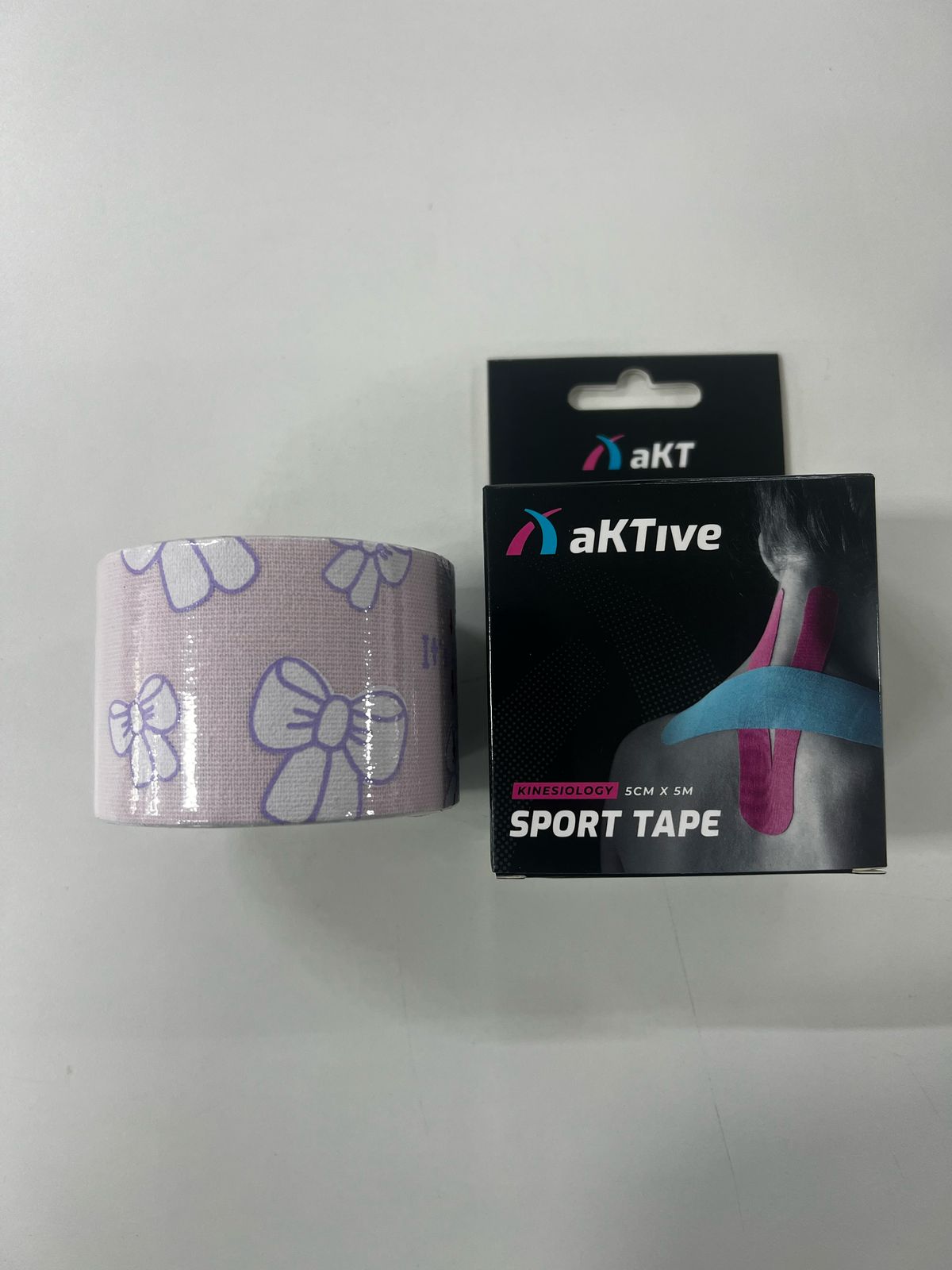 KINESIO BANDAGEM ADESIVA - AKTIVE TAPE ROSA LACINHO 5 M X 5 CM